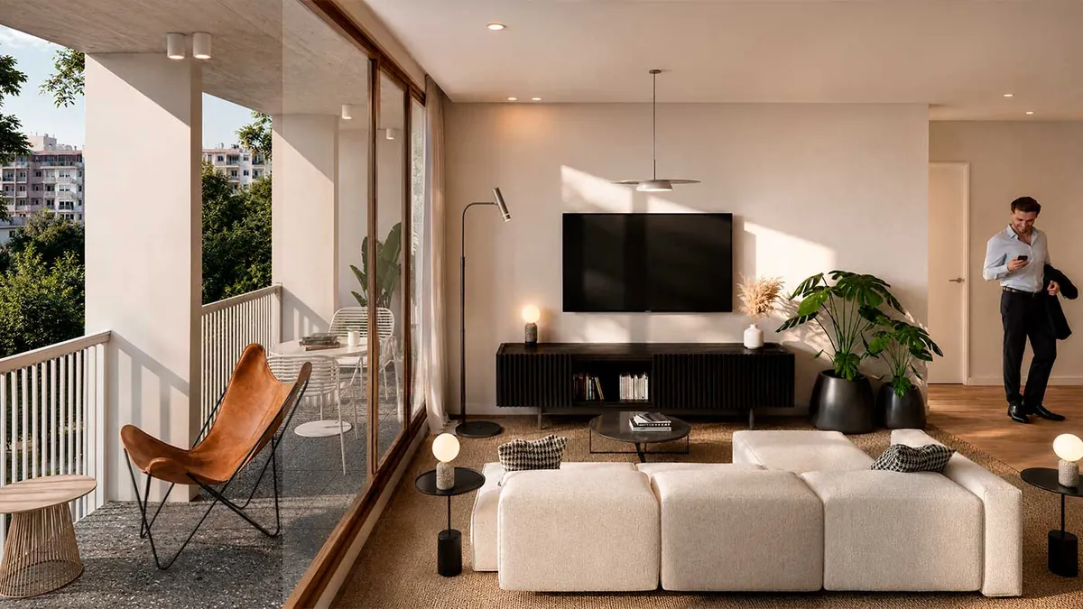 Interiores de living comedor y balcón aterrazado en edificio Up! Núñez